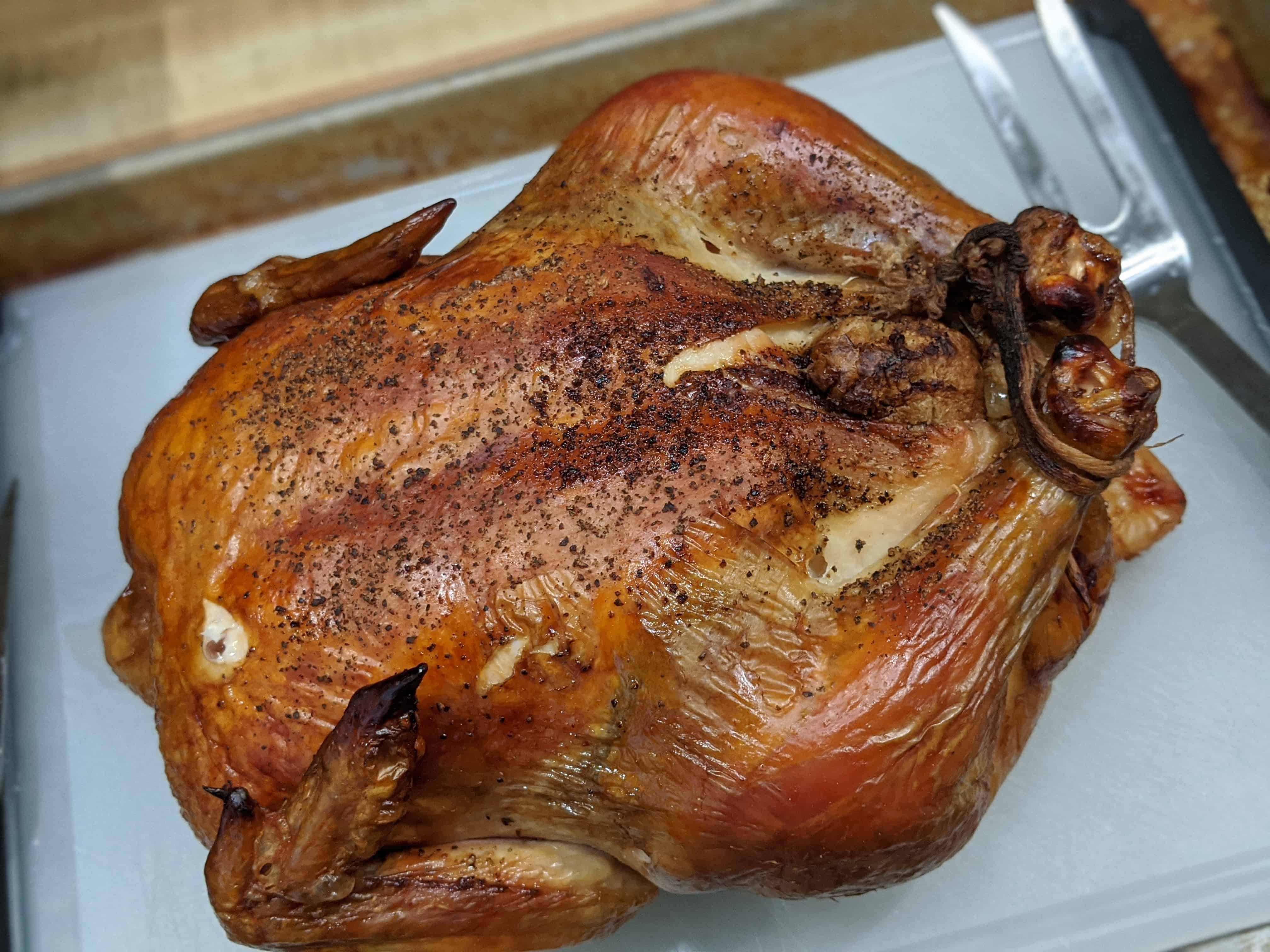 Mouthwatering and delicious Roasted Chicken on Weber Charcoal Grill